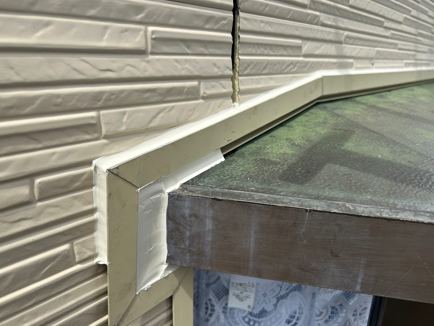 金属サイディングカバー工事 