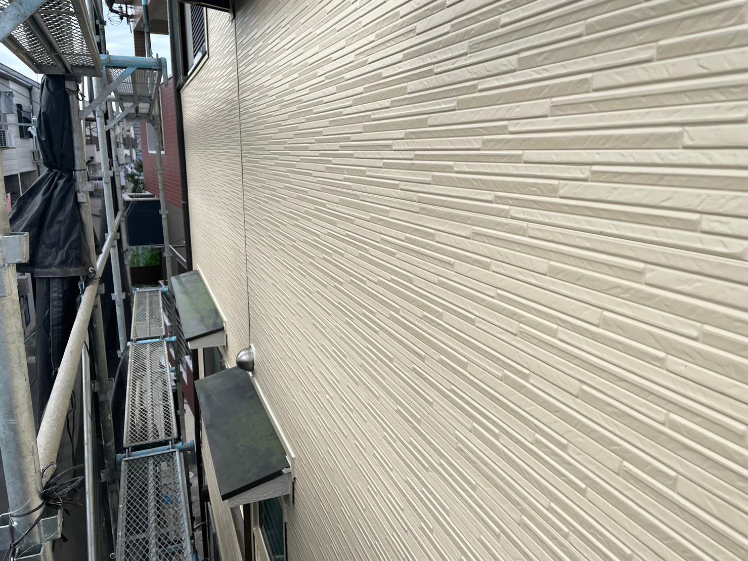 金属サイディングカバー工事 