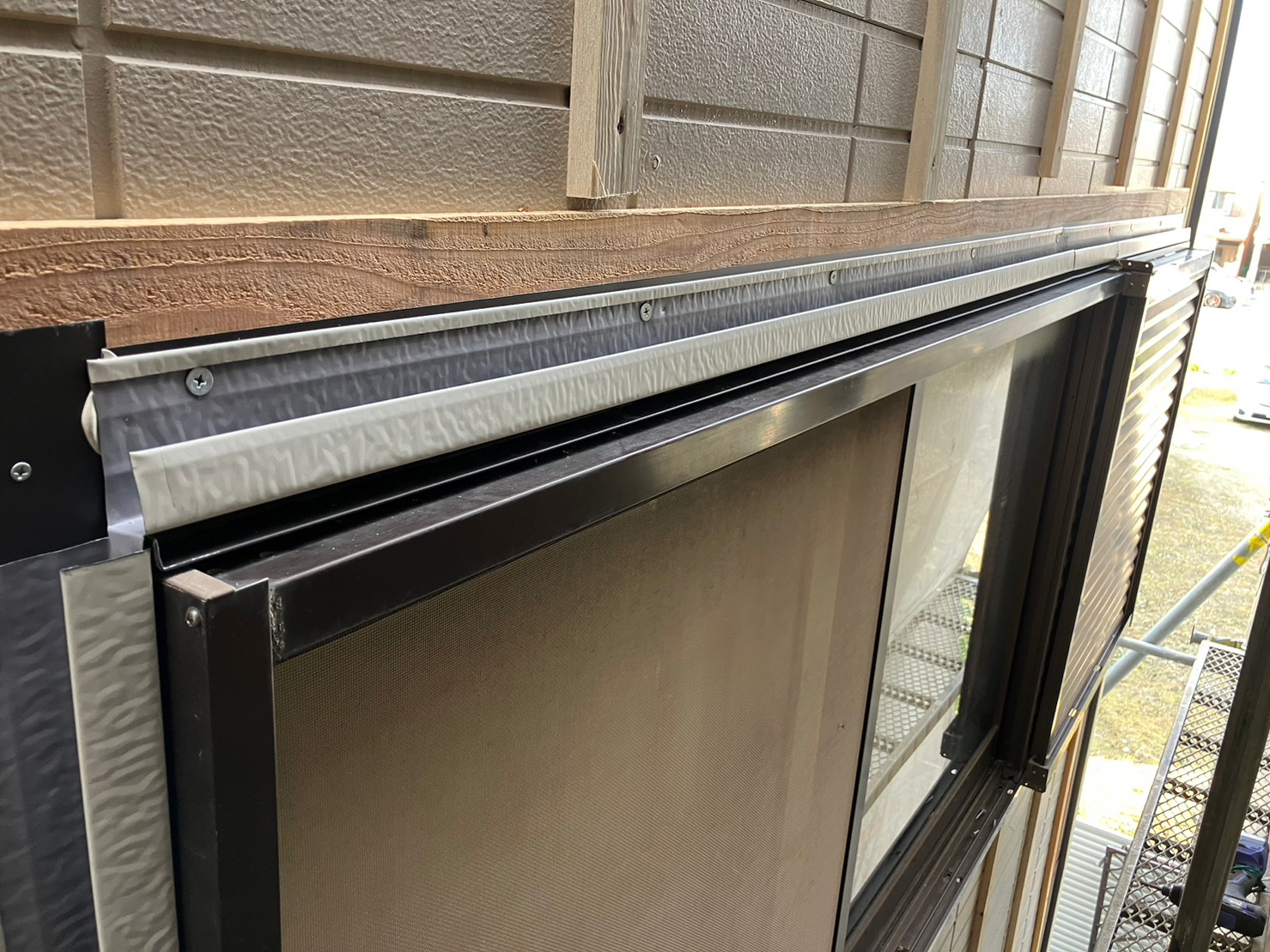 金属サイディングカバー工事 